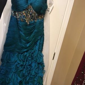 Teal mermaid formal gown